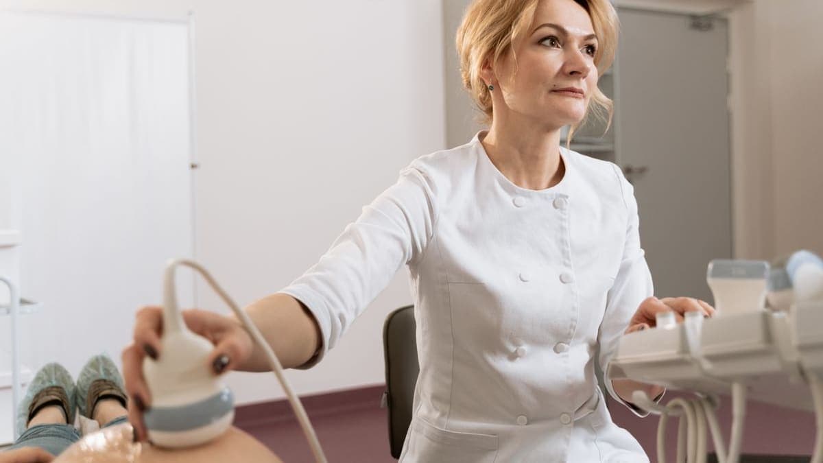 Expectant mother holding an ultrasound image